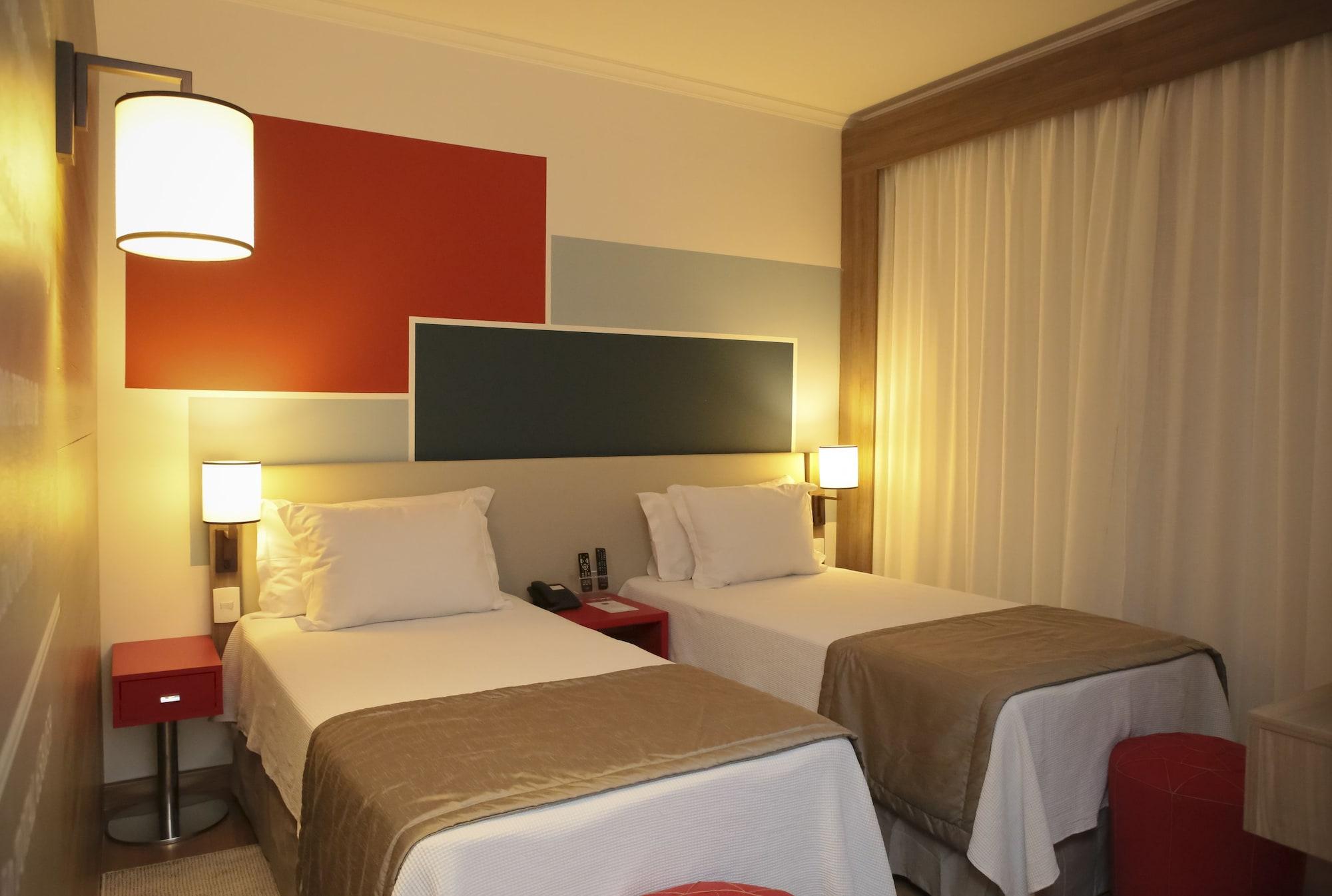 TRYP By Wyndham Ribeirão Preto Hotel Exterior foto A room at the hotel