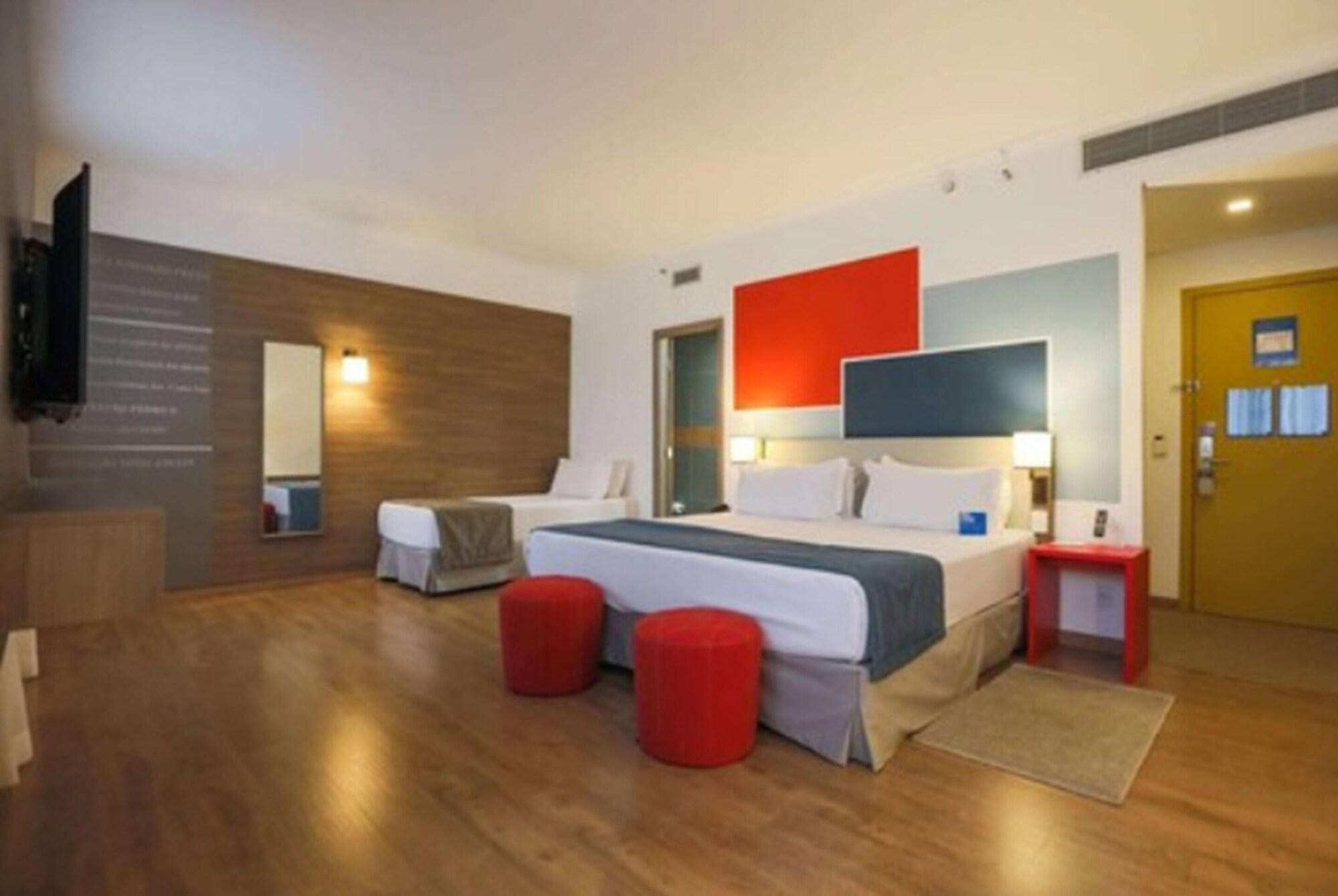 TRYP By Wyndham Ribeirão Preto Hotel Exterior foto A room at the hotel