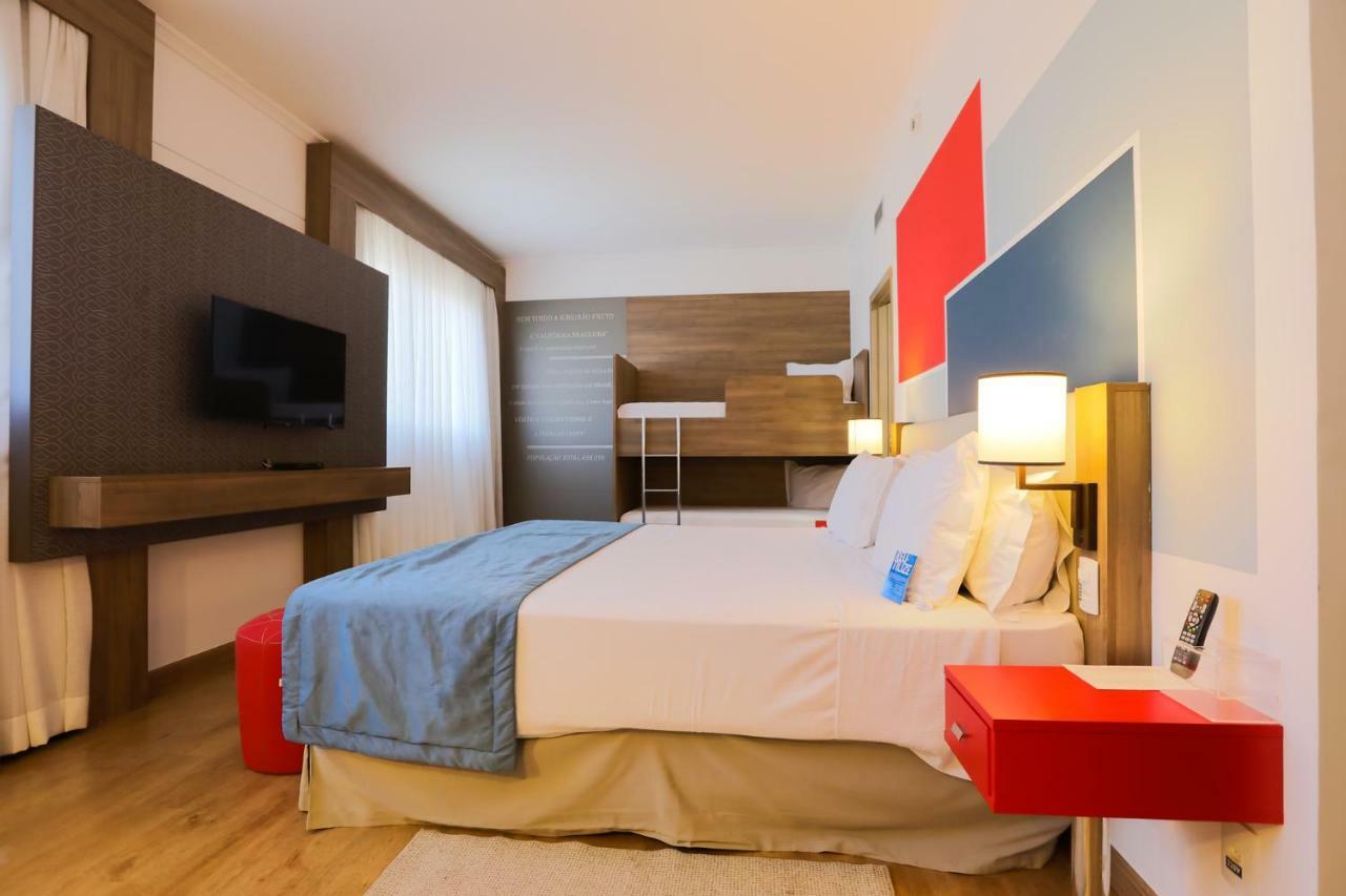 TRYP By Wyndham Ribeirão Preto Hotel Exterior foto A room at the hotel
