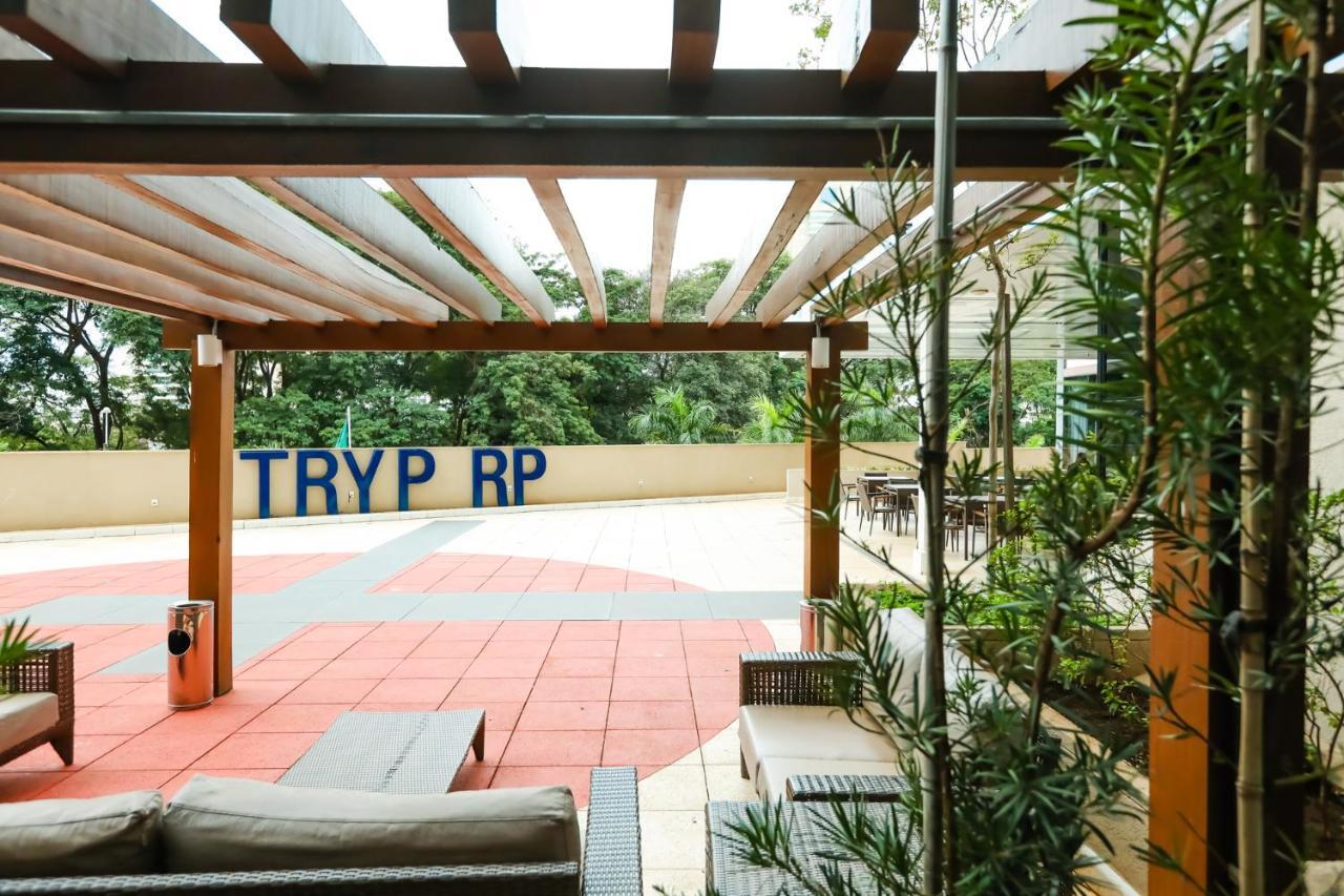 TRYP By Wyndham Ribeirão Preto Hotel Exterior foto The rooftop of the RP Library